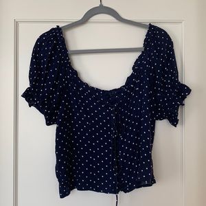 Blue and white polka dot puff sleeve top